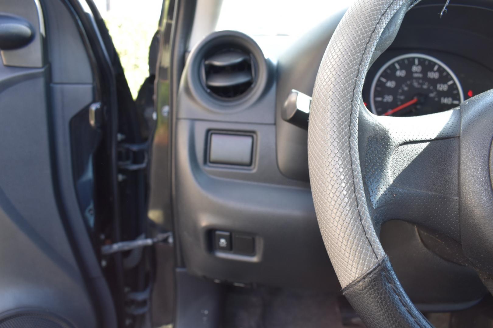 2014 Black /Black Nissan Versa 1.6 S 5M (3N1CN7AP2EL) with an 1.6L L4 DOHC 16V engine, CVT transmission, located at 5925 E. BELKNAP ST., HALTOM CITY, TX, 76117, (817) 834-4222, 32.803799, -97.259003 - The 2014 Nissan Versa 1.6 S 5M offers several benefits, including its fuel efficiency, spacious interior, and affordable price tag. It's also known for its reliability and low maintenance costs, making it a practical choice for budget-conscious buyers. Additionally, its simple yet functional design - Photo#10